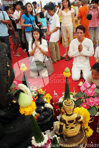 Image of Thai Buddhists pray on Buddha's birthday, Bangkok, Thailand
