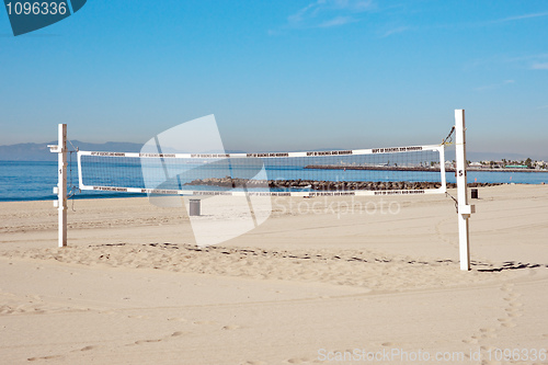 Image of volleyball net on beach
