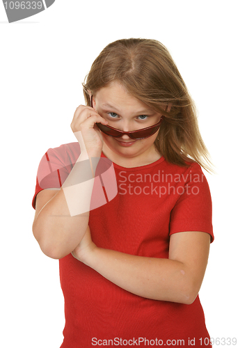 Image of young girl looking over sunglasses
