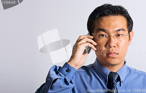 Image of Asian Businessman with Phone