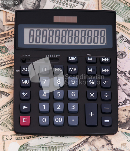 Image of Calculator and money