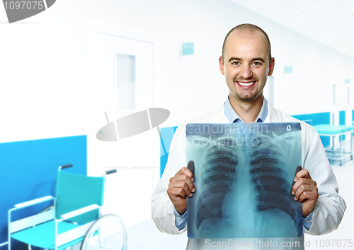 Image of smiling doctor with xray