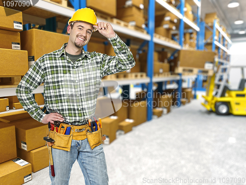 Image of warehouse and manual worker