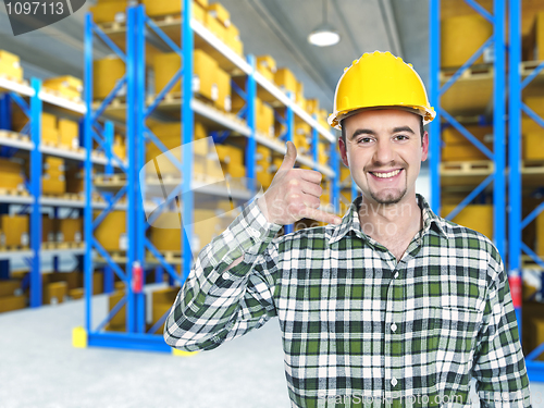 Image of smiling worker in warehouse