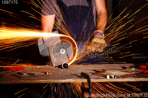 Image of grinder in action