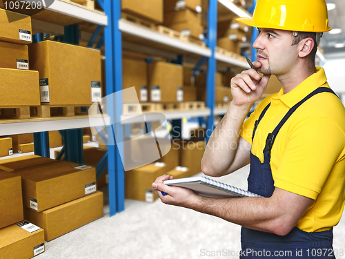 Image of warehouse and manual worker