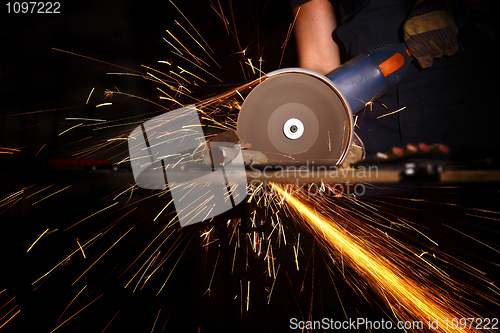 Image of grinder in action