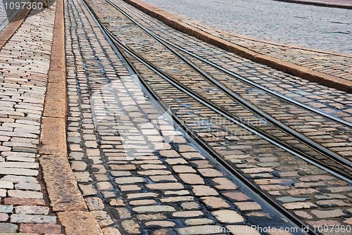Image of rails and pavement