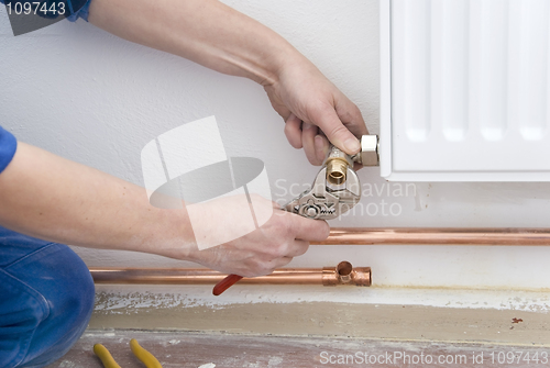 Image of plumber radiator