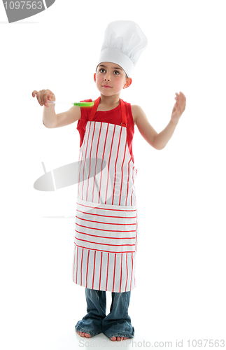 Image of Young boy chef