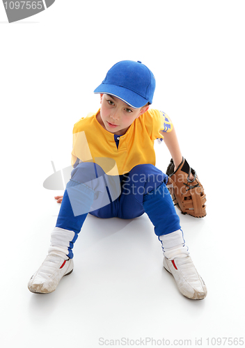 Image of Young boy baseball t-ball player