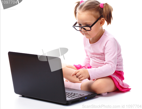 Image of Little girl with laptop