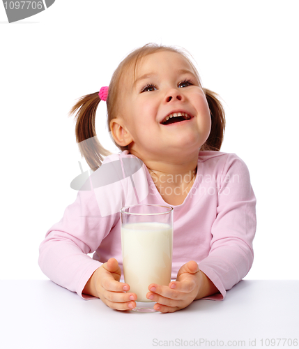 Image of Little girl with a glass of milk