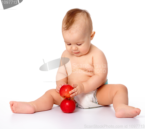 Image of Little child with apple