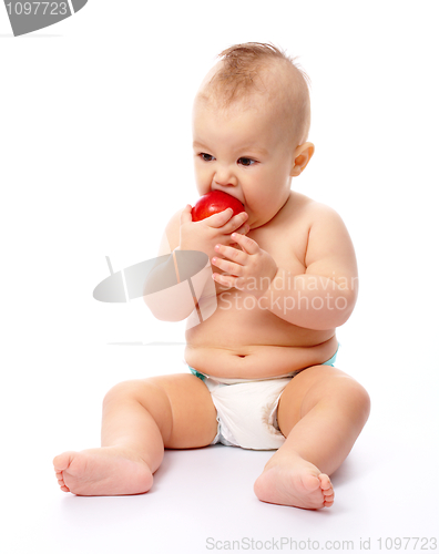 Image of Little child with apple