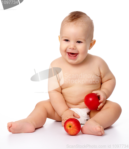 Image of Little child with apple