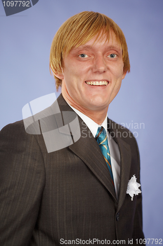 Image of Happily smiling groom