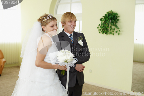 Image of Bride and groom in solemn moment