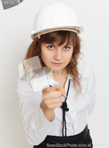 Image of Woman in protective helmet - engineer under safety precautions s
