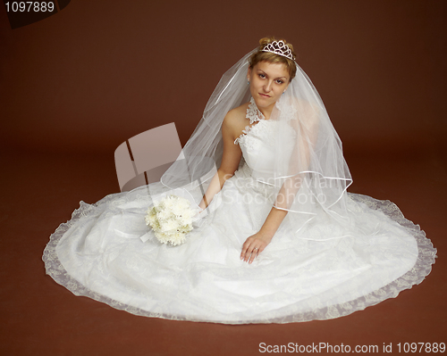 Image of Beautiful young bride in white dress