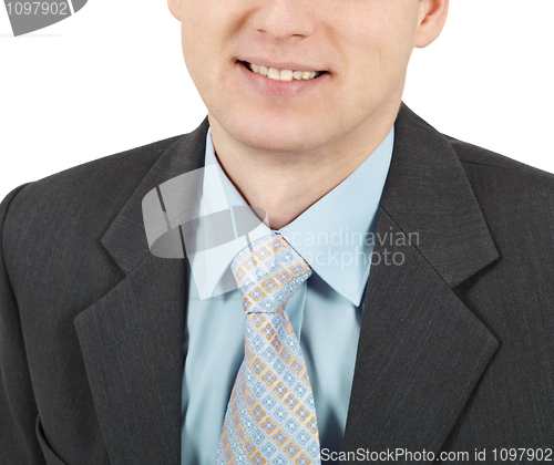 Image of Smiling young businessman