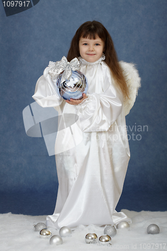 Image of Girl holding New Year's ball