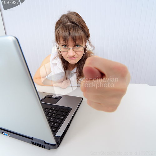 Image of Woman bookkeeper cocks a snook in a pay day