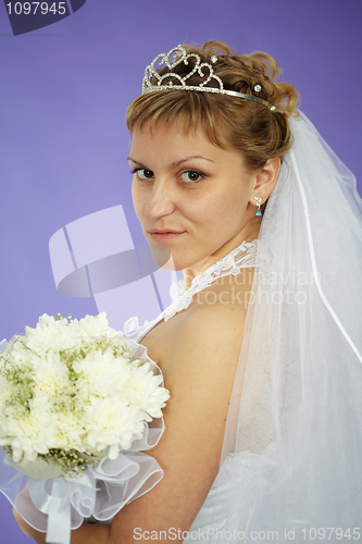 Image of Bride looks at us - portrait