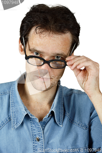 Image of Young disheveled man in glasses