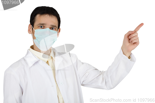 Image of Young man in medical mask points finger