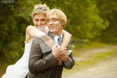 Image of Happy young bride and groom