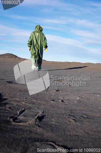 Image of Scientific ecologist in overalls in desert