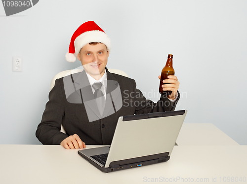 Image of Office clerk celebrate Christmas at work