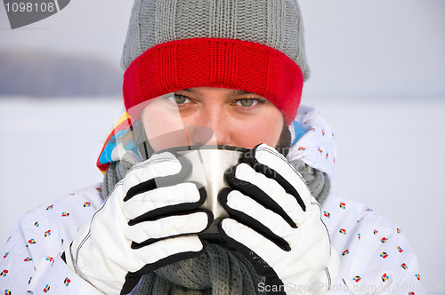 Image of woman drink hot tea