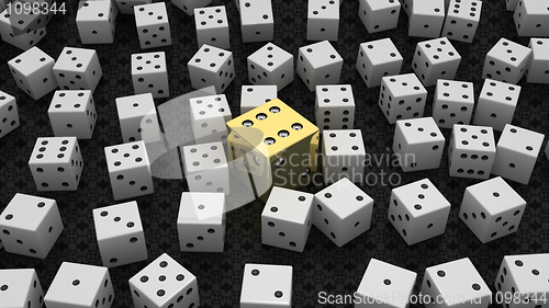 Image of Golden die among common ones over black 