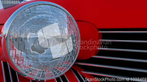 Image of Headlight of red retro car 