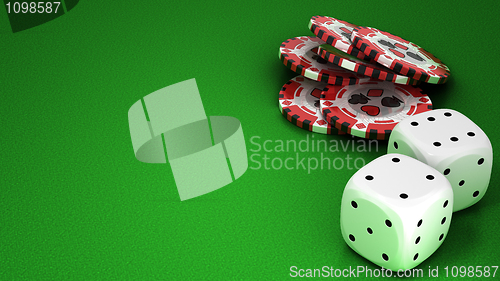Image of Casino or roulette chips and dies over green