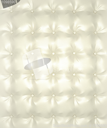 Image of White and silver buttoned leather pattern