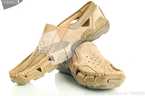 Image of Pair of beige mens shoes moccasins