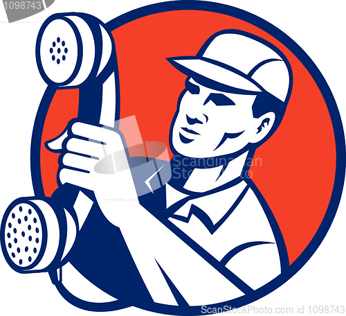 Image of Telephone repairman holding out phone