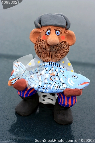 Image of Fisherman. Clay toy