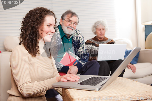 Image of Family with laptop