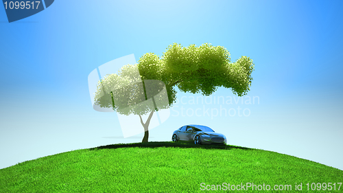 Image of Modern vehicle under tree on green fileld