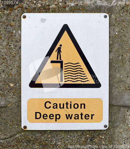 Image of caution deep water sign on wall