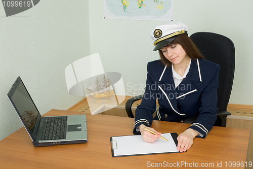 Image of Woman in uniform sailor in office