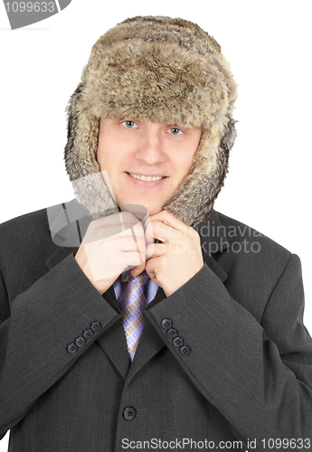 Image of Cheerful man in a fur hat