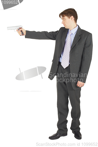 Image of Businessman aiming a gun