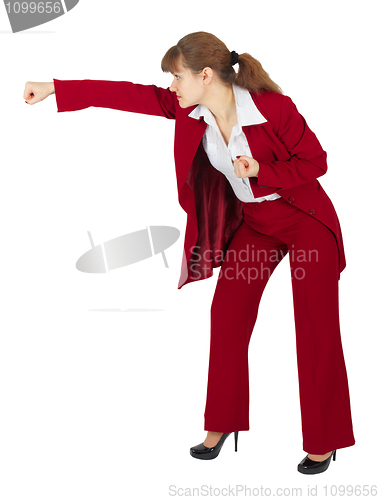 Image of Woman in red business suit breaks hand