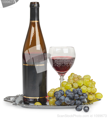 Image of Still life - bottle of wine glass and grapes on white