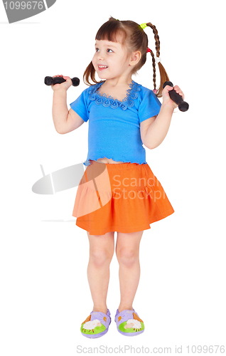 Image of Girl in dress with dumbbells in hands on white background